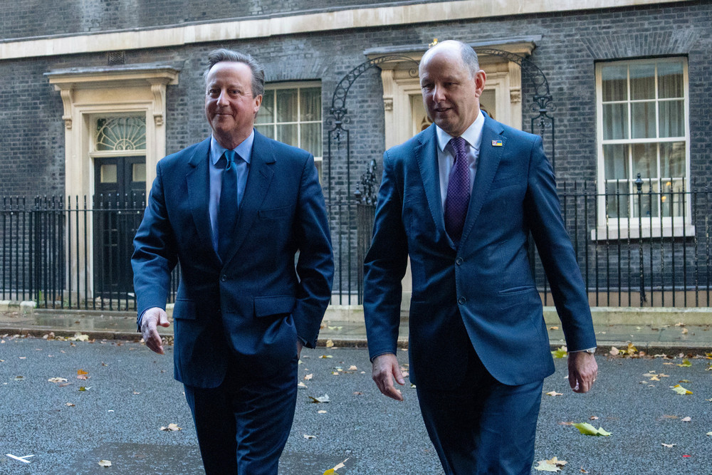 Britain's former Prime Minister David Cameron leaves 10 Downing Street with Sir Philip Barton, the Under-Secretary of the Foreign, Commonwealth and Development Office, after being appointed Foreign Secretary today. 