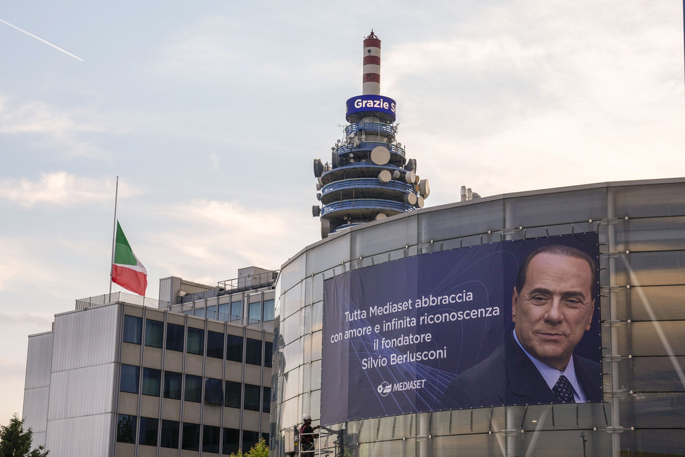A giant poster paying tribute to former Italian Premier Silvio Berlusconi hangs at the Mediaset media conglomerate headquarters in Cologno Monzese, near Milan.