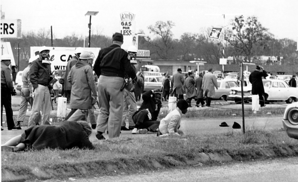On this date in 1965: Civil rights demonstrators struggle on the ground as state troopers use violence to break up a march in Selma, Ala., on what is now known as Bloody Sunday. The supporters of black voting rights organized a march from Selma to Montgomery to protest the killing of a demonstrator by a state trooper and to improve voter registration for Black Americans. 
