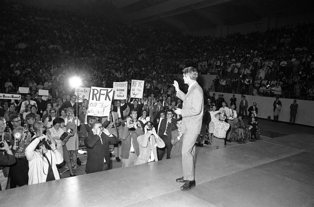 On this date in 1968: Sen. Robert Kennedy waves to an audience of students as as he arrives on stage at the University of Alabama in Tuscaloosa.