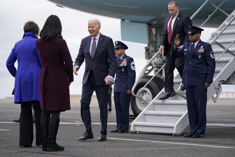 President Joe Biden arrives at Boston Logan International Airport to attend several campaign fundraisers on Tuesday, Dec. 5, 2023.