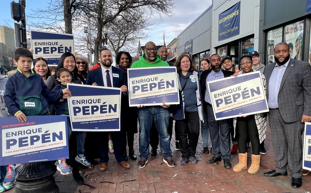 Boston politicians hold signs for Enrique Pepen