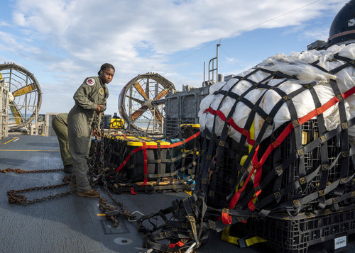 Sailors prepare material recovered in the Atlantic Ocean from a high-altitude balloon for transport to federal agents at Joint Expeditionary Base Little Creek. 