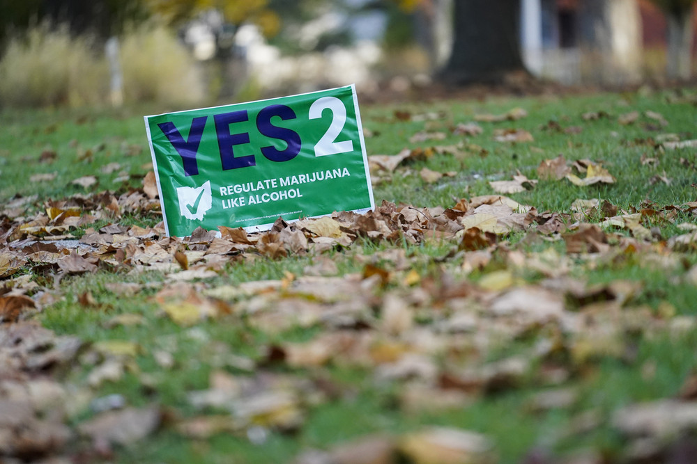 A sign supporting Issue 2 sits in a residential yard on Election Day in Cincinnati, Ohio.