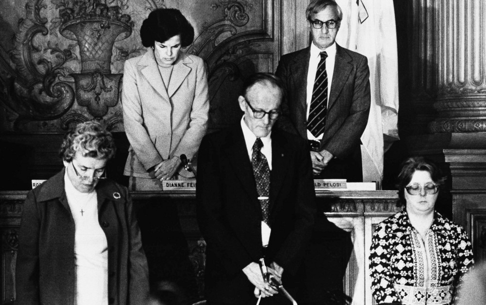 On this date in 1978: San Francisco Mayor George Moscone and Supervisor Harvey Milk were shot to death at City Hall. Pictured, the San Francisco Board of Supervisors, presided over by then-president and acting Mayor Dianne Feinstein (top left) bow their heads in silence. 
