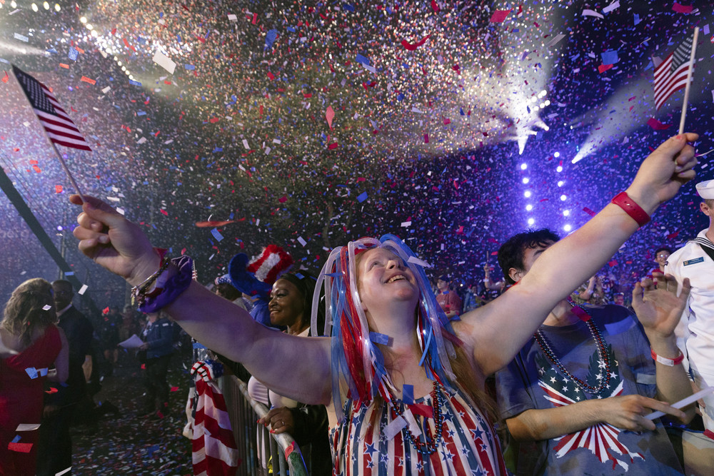 Confetti falls on the audience during the Boston Pops Fireworks Spectacular at the Hatch Shell, Tuesday, July 4, 2023, in Boston. (AP Photo/Michael Dwyer)