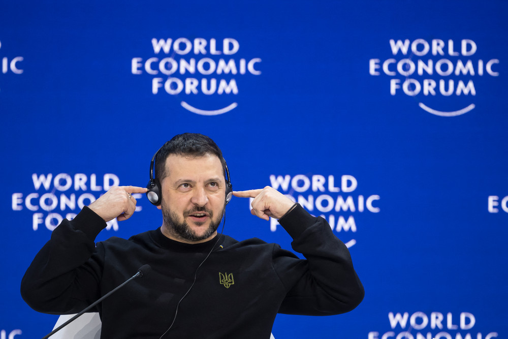 Ukrainian President Volodymyr Zelenskyy gestures while addressing the assembly at the World Economic Forum annual meeting in Davos. 