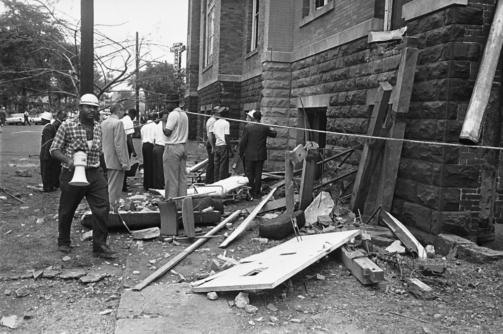 On this date in 1963: A civil defense worker and firefighters walk through debris from an explosion which struck the 16th Street Baptist Church, killing and injuring several people, in Birmingham, Ala. The attack was carried out by white supremacists. 