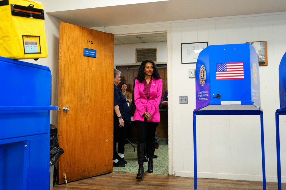 Mazi Pilip arrives to vote early at a polling station in Massapequa, New York. 