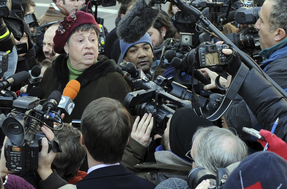 On this date in 2009: Bernie Madoff pleads guilty to 11 federal felonies, admitting his culpability in the world's largest Ponzi scheme. Pictured is Judith Welling, a Manhattan resident who lost money investing with Madoff, speaking to the media outside the courthouse. 