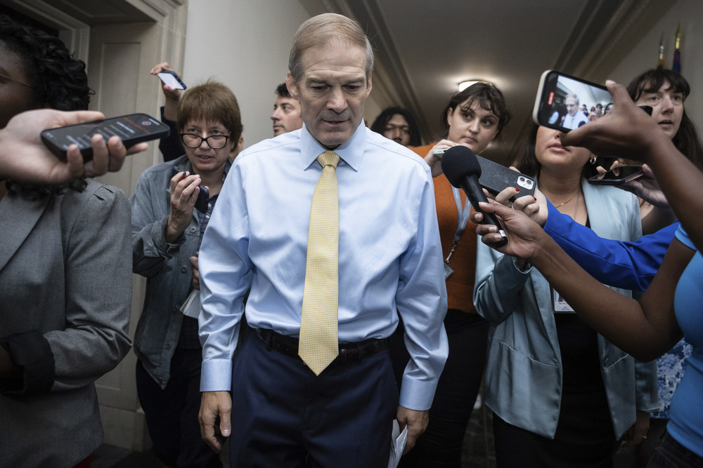 Representative Jim Jordan speaks with reporters as he departs a House Republican Conference meeting on Capitol Hill on October 13, 2023.