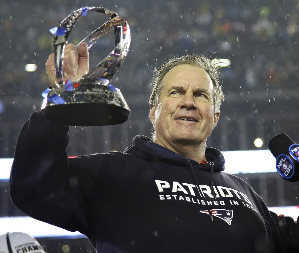 FILE - New England Patriots head coach Bill Belichick holds the championship trophy after the NFL football AFC Championship game Sunday, Jan. 18, 2015, in Foxborough, Mass. The Patriots defeated the Colts 45-7 to advance to the Super Bowl against the Seattle Seahawks. Six-time NFL champion Bill Belichick has agreed to part ways as the coach of the New England Patriots on Thursday, Jan. 11, 2024, bringing an end to his 24-year tenure as the
 architect of the most decorated dynasty of the league’s Super Bowl era, a source told the Associated Press on the condition of anonymity because it has not yet been announced.(AP Photo/Matt Slocum, File)