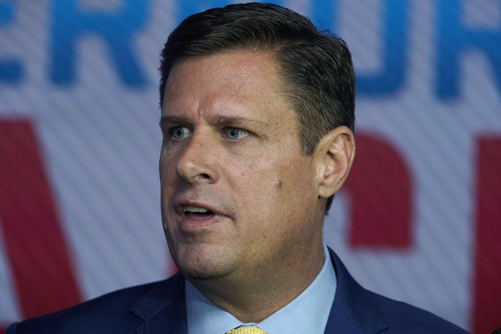 Massachusetts Republican Geoff Diehl faces reporters following a televised debate for governor with Massachusetts Democratic Attorney General Maura Healey, Wednesday, Oct. 12, 2022, at NBC10 Boston television studios, in Needham, Mass. (AP Photo/Steven Senne)