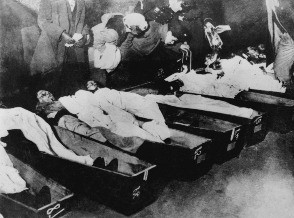 On this date in 1911: The Triangle Shirtwaist factory fire in New York kills 146 garment workers — because the doors to the exits were locked, workers were trapped as the fire began. Pictured are family members attempting to identify the dead victims of the fire. 