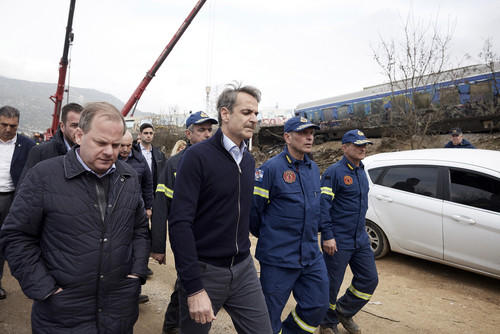 Greek Prime Minister Kyriakos Mitsotakis visits the location of a train collision in Tempe, Greece. 