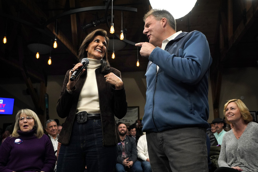 Republican presidential candidate Nikki Haley and Gov. Chris Sununu appear at a town hall campaign event, Tuesday, Dec. 12, 2023, in Manchester, N.H. Haley received the New Hampshire governor's endorsement. (AP Photo/Robert F. Bukaty)