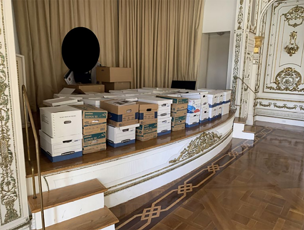 In this handout photo provided by the U.S. Department of Justice, stacks of boxes can be observed in the White and Gold Ballroom of former President Donald Trump's Mar-a-Lago estate in Palm Beach, Fla. 