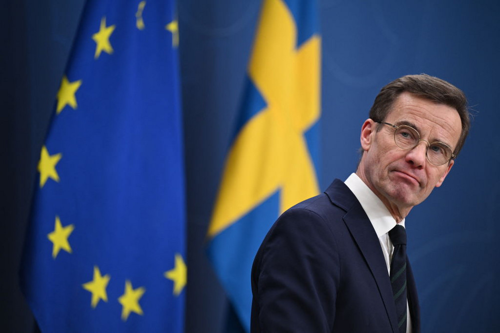 Sweden's Prime Minister Ulf Kristersson attends a press conference in Stockholm after Hungary's parliament voted yes to ratify Sweden's NATO accession. 