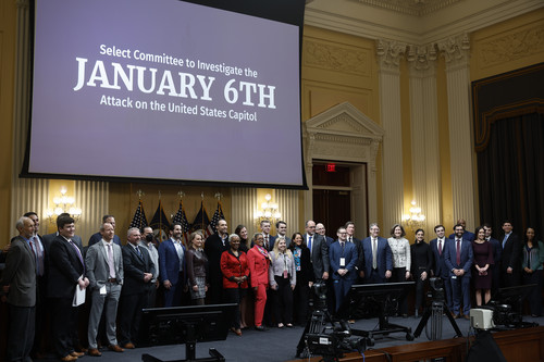 Staff members of the House Select Committee to Investigate the January 6 Attack on the U.S. Capitol pose for a group photo following the committee's last public hearing.