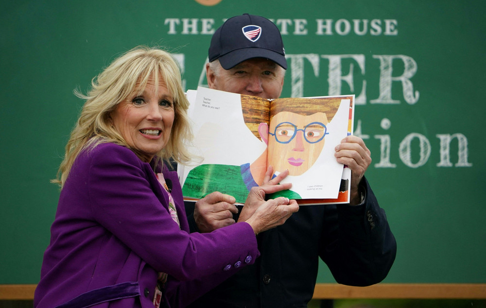 President Joe Biden and First Lady Jill Biden read a book to children during the annual Easter Egg Roll on the South Lawn of the White House on April 18, 2022.