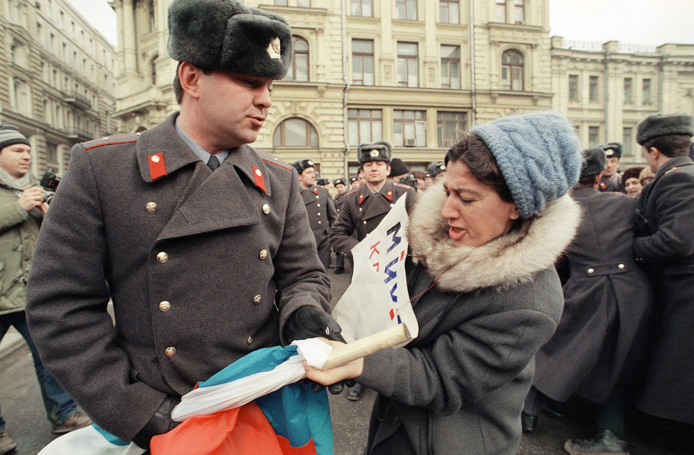 On this date in 1991: A Soviet policeman tries to tear up a poster from a pro-Yeltsin demonstrator in Moscow, as other protesters are being arrested. The protesters defied President Gorbachev's decree which banned all demonstration in Moscow. 