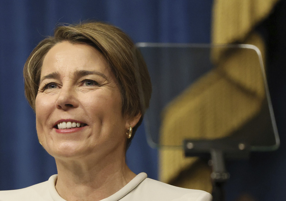 FILE - Massachusetts Gov. Maura Healey smiles during inauguration ceremonies in the House Chamber at the Statehouse, Jan. 5, 2023, in Boston. Gov. Healey unveiled a new proposal Tuesday, Jan. 16, 2024 aimed at creating more access to child care and early education, particularly in the state’s former industrial “Gateway Cities." Healey said the plan would guarantee that every 4-year-old in the 26 cities has the chance — at
 low or no cost — to enroll their child in a high-quality preschool program. (Jessica Rinaldi/The Boston Globe via AP, Pool, File)