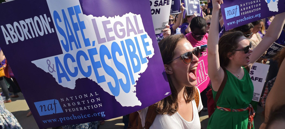 An abortion rights activist march in Texas. (photo: Mandel Ngan/Getty)
