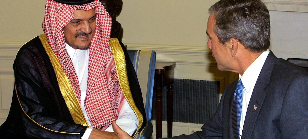 President George W. Bush meets with Saudi Arabia's Foreign Minister Saud al-Faisal on Sept. 20, 2001, in the Oval Office of the White House in Washington, D.C. (photo: Paul J. Richards/AFP/Getty Images)