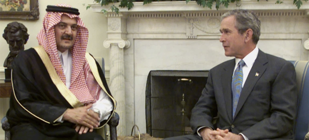 President George W. Bush speaks with Saudi Arabia's foreign minister Prince Saud al-Faisal at the White House on September 20, 2001. (photo: Reuters)
