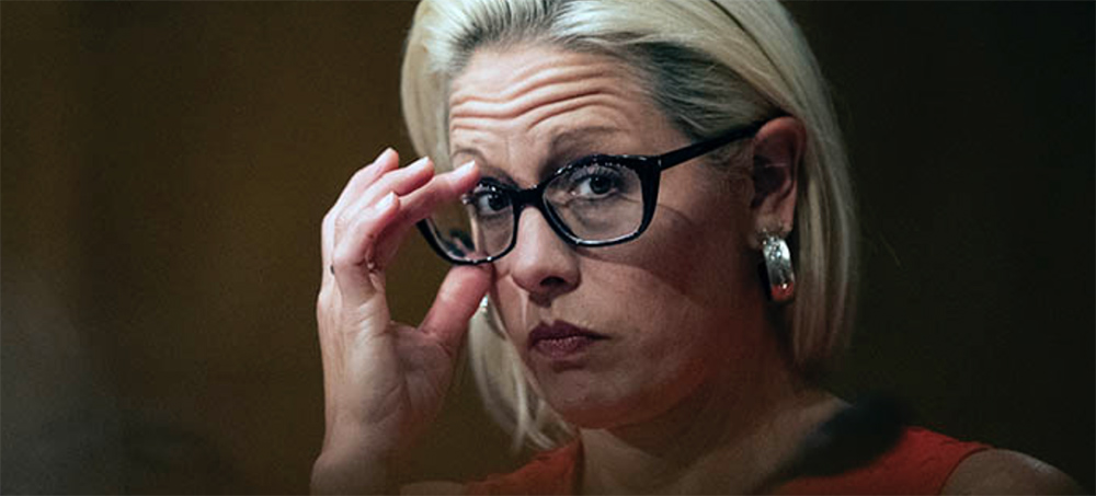 Sen. Kyrsten Sinema (D-Ariz.) delivered a tough ultimatum to President Joe Biden at a private meeting Wednesday on infrastructure. (photo: Manuel Balce Ceneta/AP)