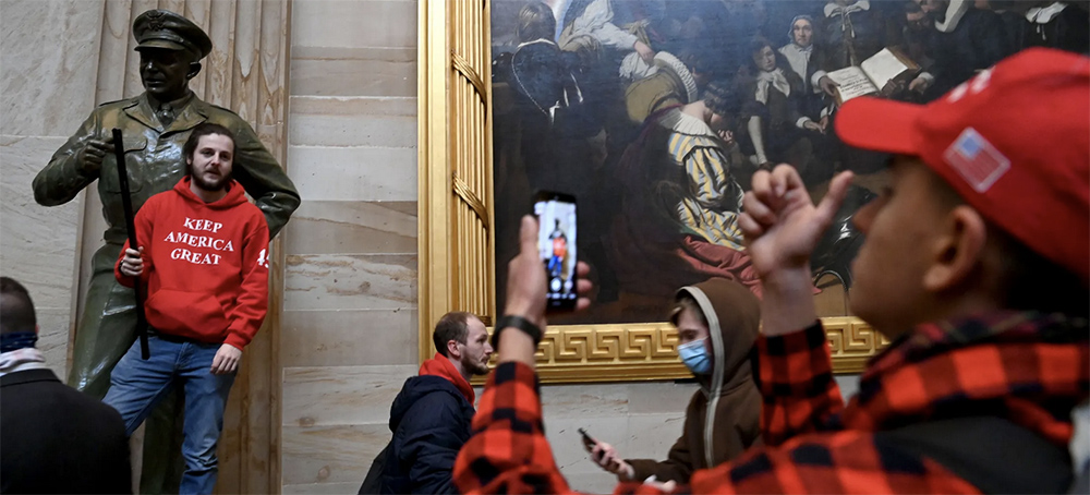 A scene from the January 6th riots at the Capitol. (photo: Saul Loeb/AFP/Getty Images)