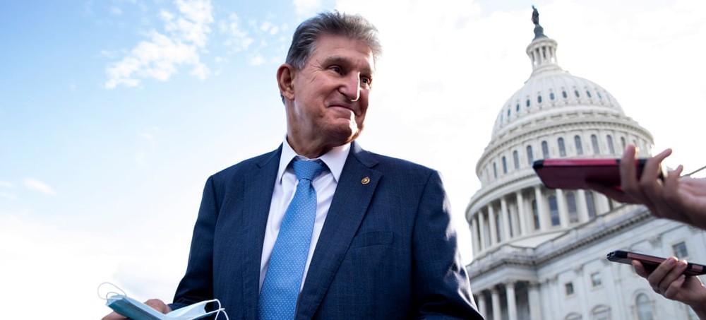 Joe Manchin doesn’t want Americans to get spoiled by unhinged socialist policies like affordable childcare, an expanded child tax credit and paid family leave. (photo: Michael Reynolds/EPA)