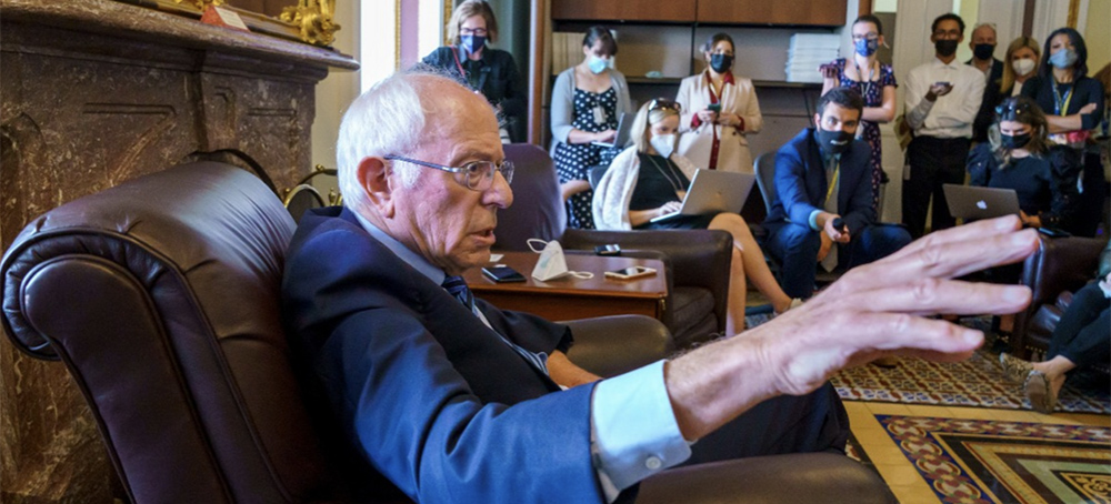 Senate Budget Chair Bernie Sanders takes questions from reporters about the debt limit vote this week, and the way forward on on President Joe Biden's domestic agenda, at the Capitol on Friday. (photo: J. Scott Applewhite/AP)