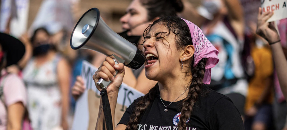 Protesters take part in the Women's March and demonstrate against Texas's S.B. 8, a near total ban on abortion, in Austin, Texas, on Oct. 2, 2021. (photo: Sergio Flores/AFP/Getty Images)