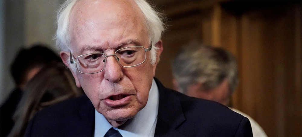 Senator Bernie Sanders (I-VT) speaks to reporters after a meeting with White House officials at the U.S. Capitol in Washington, U.S., October 27, 2021. (photo: Elizabeth Frantz/Reuters)