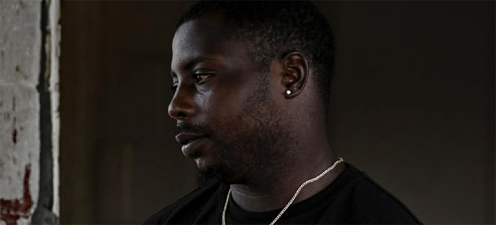Dontrell Grier, a stepbrother of Cedric Mifflin, an unarmed Black man killed by a police officer during a traffic stop in 2017, at his auto shop in Columbus, Ga., Oct. 8, 2021. (photo: Kenny Holston/NYT)