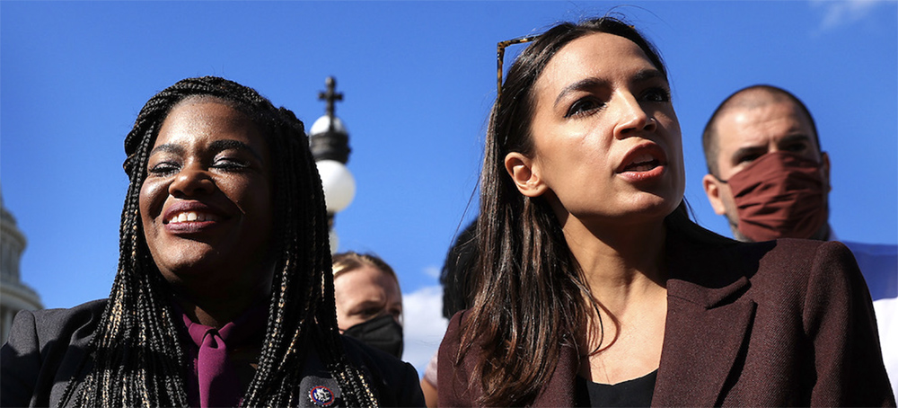 Representatives Cori Bush and Alexandria Ocasio-Cortez talk to reporters outside the U.S. Capitol in Washington, D.C. (photo: Chip Somodevilla/Getty Images)