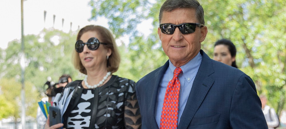 Michael Flynn, President Trump's former national security adviser, leaves federal court with lawyer Sidney Powell in September 2019. (photo: Manuel Balce Ceneta/AP)