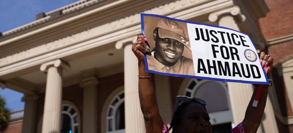 Protester outside of the courthouse in the trial of three men charged in Ahmaud Arbery's fatal shooting, in Brunswick, Ga. (photo: Getty)