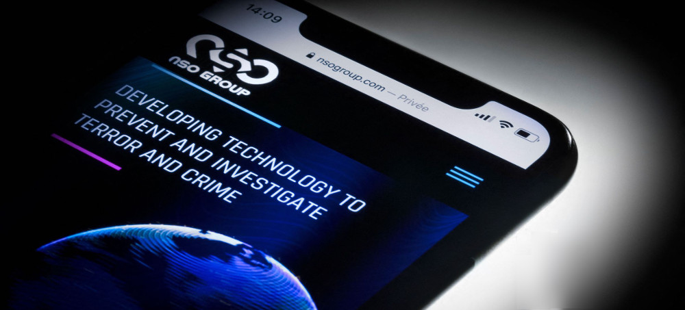 This studio photographic illustration shows a smartphone with the website of Israel's NSO Group which features 'Pegasus' spyware, on display in Paris, July 21, 2021. (photo: Joel Saget/Getty)