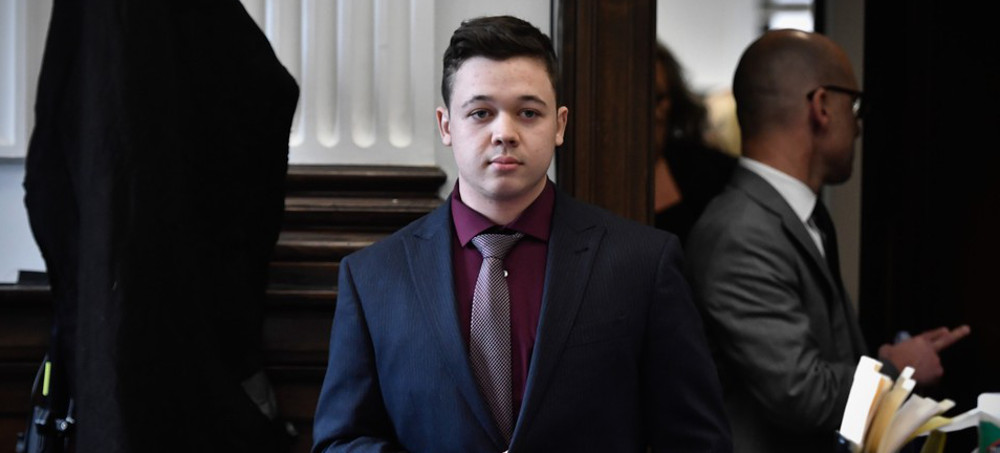 Kyle Rittenhouse's comments about his former lawyer, a top leader in the QAnon world, has unleashed a toxic battle within the conspiracy movement. (photo: Sean Krajacic/Getty)