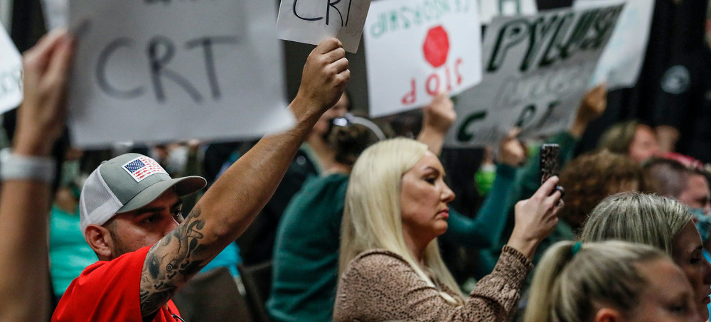 An even mix of proponents and opponents to teaching Critical Race Theory are in attendance as the Placentia Yorba Linda School Board discusses a proposed resolution to ban it from being taught in schools. (photo: AP)