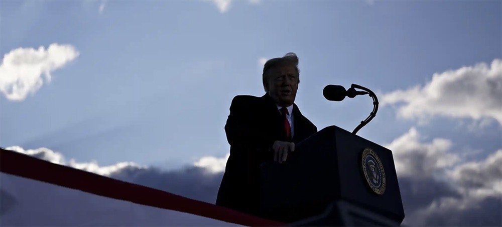 Donald Trump speaks during a farewell ceremony at Joint Base Andrews, Maryland, on 20 January this year. (photo: Rex/Shutterstock)