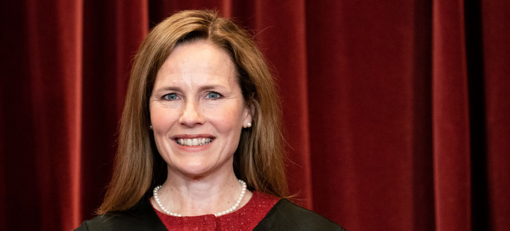 Associate Justice Amy Coney Barrett stands during a group photo of the justices at the Supreme Court in Washington, D.C., April 23, 2021. (photo: Erin Schaff-Pool/Getty)