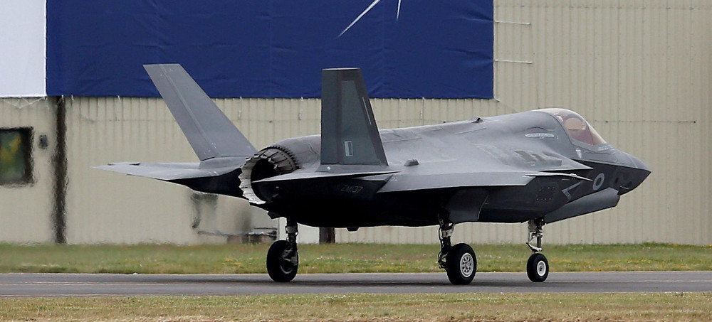 A RAF Lockheed Martin F-35B fighter jet taxis along a runway. (photo: Peter Nicholls/Reuters)