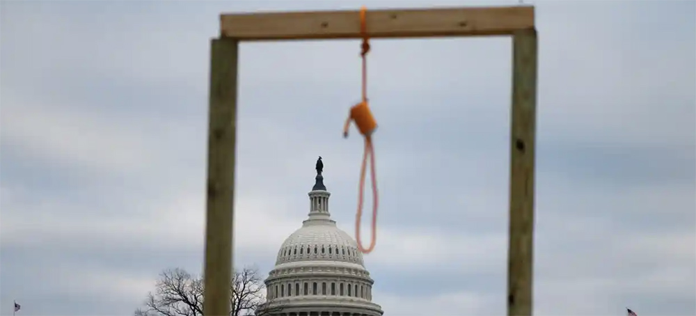 Supporters of Donald Trump displayed a gallows as they gathered outside the US Capitol on 6 January 2021. (photo: Andrew Caballero-Reynolds/AFP/Getty Images)