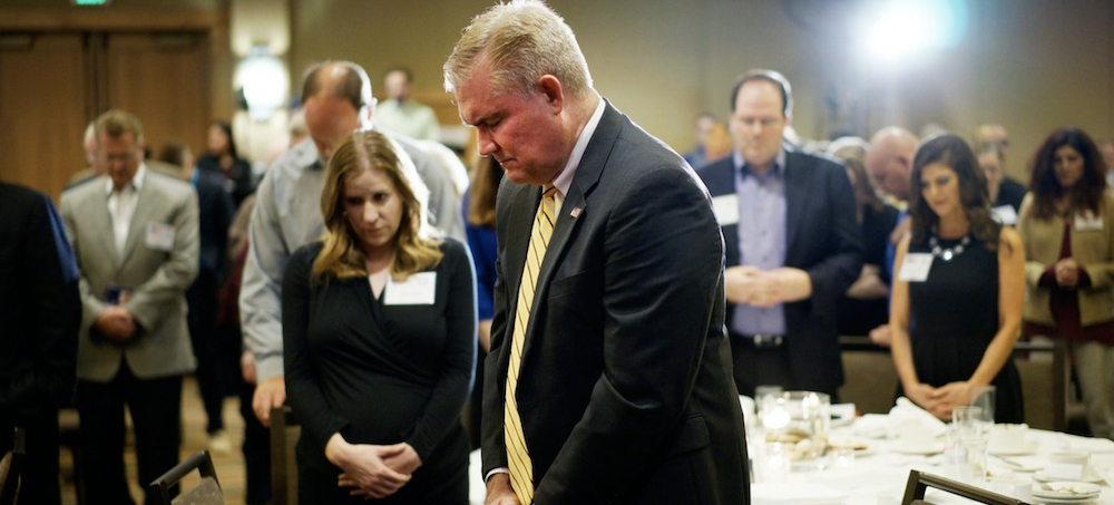 Chad Connelly, a key player in the Christian nationalist movement, prayed with pastors at a 2014 gathering in Westminster, Colorado. (photo: Rick Wilking/Reuters)