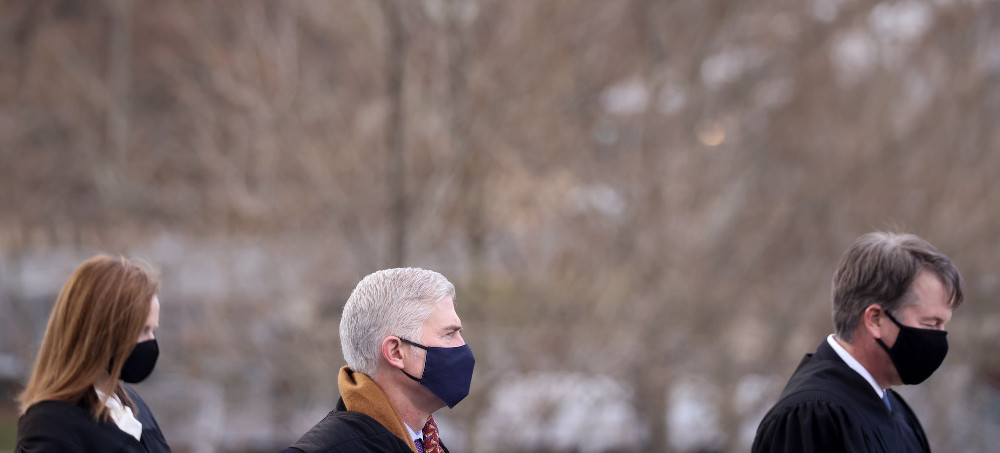 Supreme Court Justices Amy Coney Barrett, Neil Gorsuch and Brett Kavanaugh. (photo: Getty)