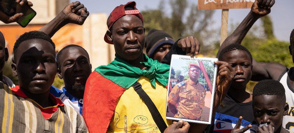 Demonstrators gathering in Ouagadougou, Burkina Faso, to show support to the military hold a picture of Lt. Col. Paul-Henri Sandaogo Damiba, Jan. 25, 2022. (photo: Olympia de Maismont/Getty)