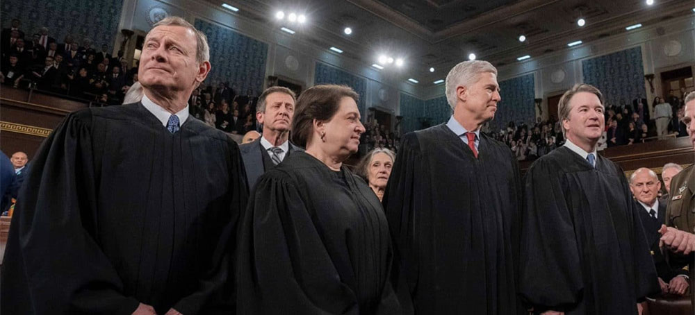 U.S. Supreme Chief Justice John G. Roberts Jr., and Associate Justices Elena Kagan, Neil M. Gorsuch, and Brett M. Kavanaugh at the State of the Union address in 2020.  (photo: Myles Cullen)